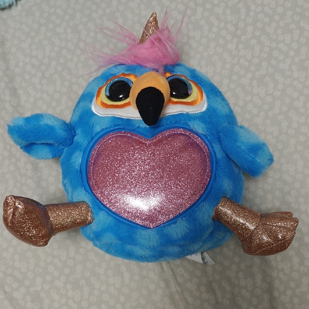 Blue Plush Toy with Pink Heart and Gold Accents